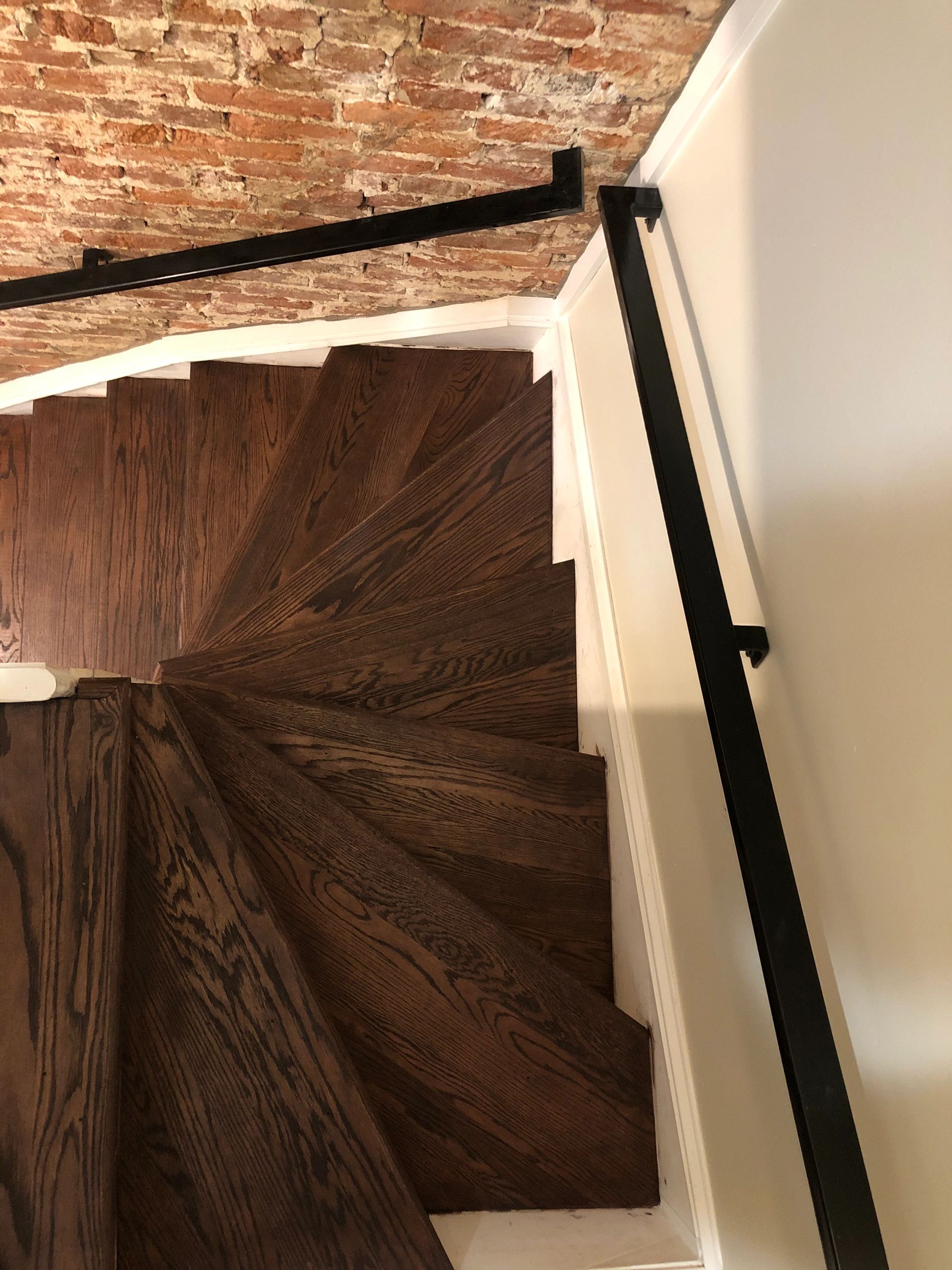 Modern interior with hardwood floor and staircase
